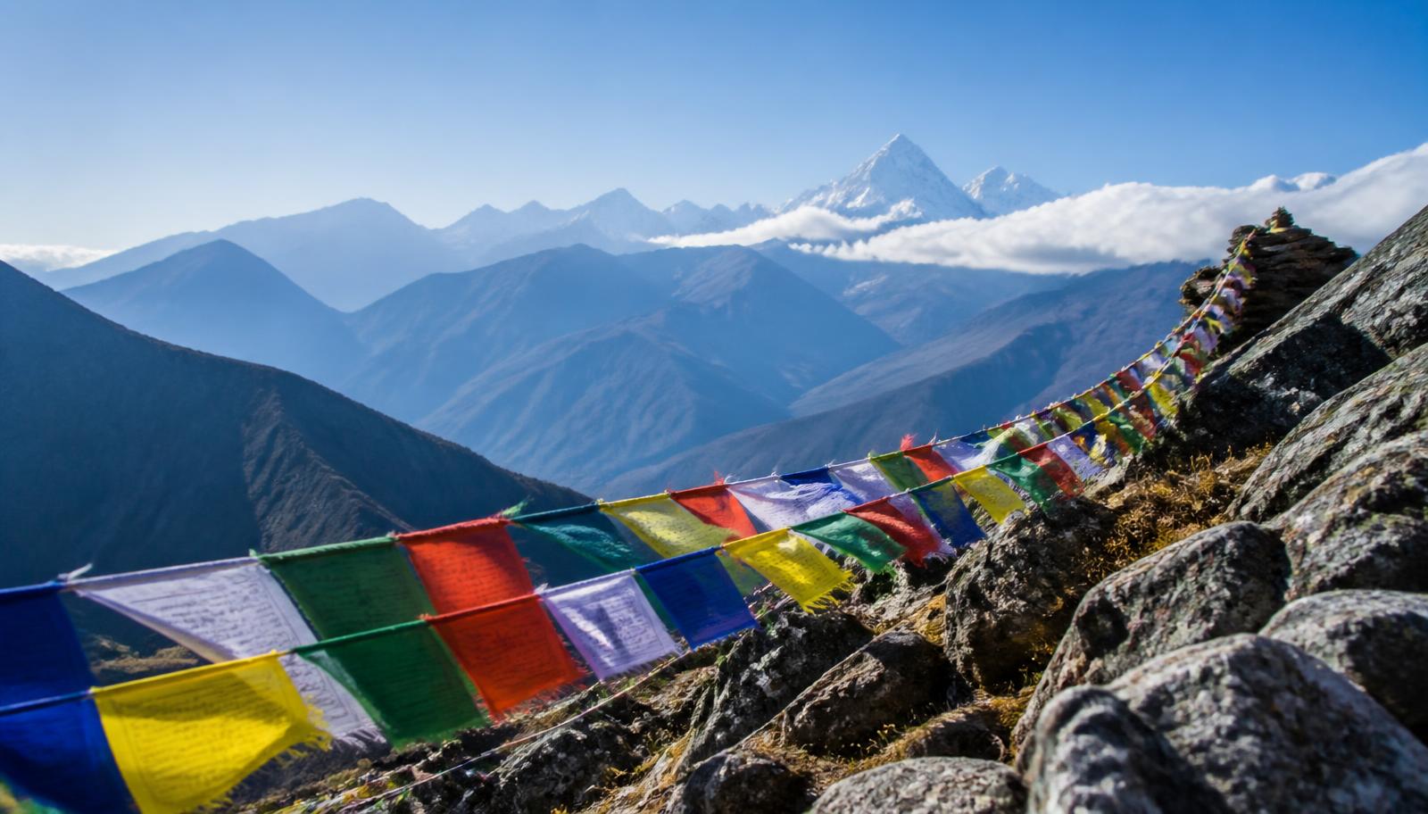 Prayer flags above a Himalayan mountain pass